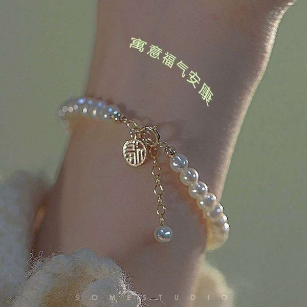 Elegant White Pearl Bracelet For Girls with Blessing Character Charm | Clasyy